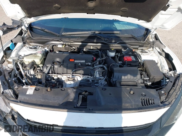 2020 Honda Civic LX with VIN 19XFC2F62LE212421, listed as a IAAI auction lot 41909995 with 46,312 mi miles and . Bid and sale history available at DreamBid. Image 10.