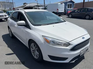 2018 Ford Focus SE z VIN 1FADP3F20JL259181, wystawiony jako IAAI lot #42400276 z przebiegiem 161 473 mil mil oraz . Historia ofert i sprzedaży dostępna na DreamBid. Obrazek 14.