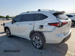 2021 Toyota Highlander XLE with VIN 5TDGZRAH6MS051275, listed as a Copart auction lot 57674685 with 72,302 mi miles and Salvage title. Bid and sale history available at DreamBid. Image 2.