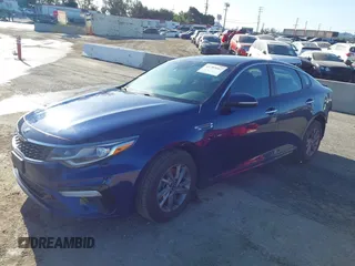 2019 Kia Optima LX with VIN 5XXGT4L35KG357596, listed as a IAAI auction lot 41785667 with 105,333 mi miles. Bid and sale history available at carsss.com. Image 2.