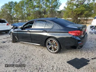 2020 BMW 5 Series M550i xDrive with VIN WBAJS7C01LCD23365, listed as a Copart auction lot 88302885 with Not provided miles and Salvage title. Bid and sale history available at DreamBid. Image 2.