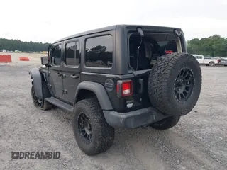 2021 Jeep Wrangler Unlimited Willys z VIN 1C4HJXDM5MW859724, wystawiony jako IAAI lot #42311203 z przebiegiem 71 887 mil mil oraz . Historia ofert i sprzedaży dostępna na DreamBid. Obrazek 3.