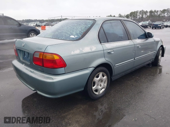 1999 Honda Civic EX z VIN 1HGEJ8643XL010821, wystawiony jako IAAI lot #41602036 z przebiegiem 165 139 mil mil oraz . Historia ofert i sprzedaży dostępna na DreamBid. Obrazek 4.
