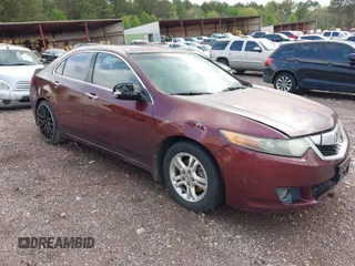 2009 Acura TSX with VIN JH4CU26699C033839, listed as a IAAI auction lot 41911985 with 163,987 mi miles. Bid and sale history available at carsss.com. Image 1.