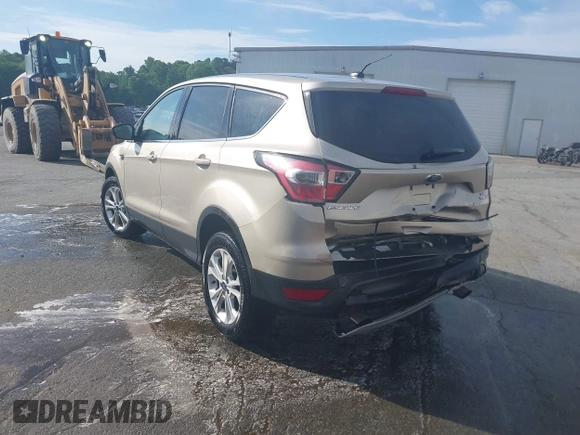 2017 Ford Escape SE with VIN 1FMCU9GD1HUC70823, listed as a IAAI auction lot 41898457 with 86,042 mi miles and . Bid and sale history available at DreamBid. Image 3.