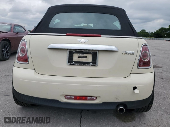 2012 MINI Convertible with VIN WMWZN3C57CT134585, listed as a Copart auction lot 55468995 with 145,645 mi miles and Clean title. Bid and sale history available at DreamBid. Image 6.