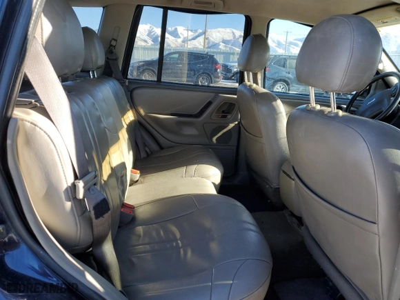 2004 Jeep Grand Cherokee Laredo with VIN 1J4GW48S44C325808, listed as a Copart auction lot 89351575 with 312,011 mi miles and Salvage Title. Bid and sale history available at carsss.com. Image 10.