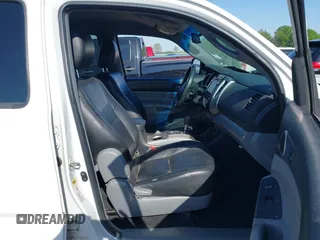 2015 Toyota Tacoma PreRunner with VIN 5TFJU4GN0FX069112, listed as a IAAI auction lot 41998443 with 49,593 mi miles and . Bid and sale history available at DreamBid. Image 5.