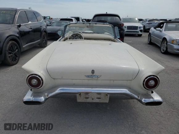 1957 Ford Thunderbird with VIN C7FH382576, listed as a Copart auction lot 75124844 with 22,465 mi miles and Salvage Title. Bid and sale history available at DreamBid. Image 6.