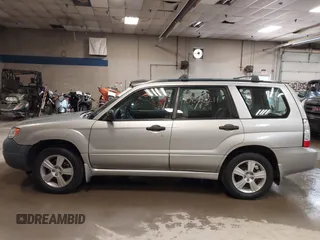 2006 Subaru Forester 2.5 X with VIN JF1SG636X6H712880, listed as a IAAI auction lot 40062211 with 127,537 mi miles. Bid and sale history available at carsss.com. Image 14.