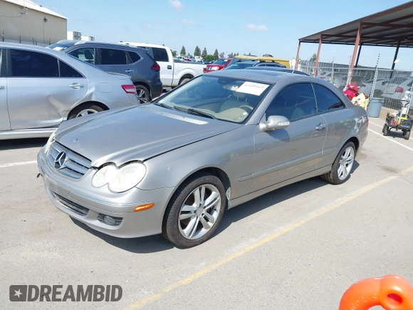 2007 Mercedes-Benz CLK-Class 3.5L with VIN WDBTJ56H47F215889, listed as a IAAI auction lot 42109563 with 106,593 mi miles. Bid and sale history available at carsss.com. Image 2.