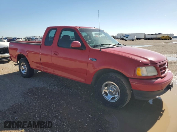 2001 Ford F-150 XL with VIN 1FTZX17211NB16120, listed as a Copart auction lot 54884765 with 124,196 mi miles and Salvage title. Bid and sale history available at DreamBid. Image 4.