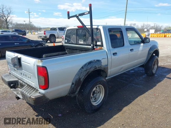 2001 Nissan Frontier SE z VIN 1N6ED27T11C371123, wystawiony jako IAAI lot #41874917 z przebiegiem 291 582 mil mil oraz . Historia ofert i sprzedaży dostępna na DreamBid. Obrazek 4.