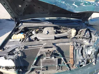 2002 Chevrolet Suburban LT with VIN 3GNFK16Z32G322198, listed as a IAAI auction lot 41524666 with Not provided miles and . Bid and sale history available at DreamBid. Image 10.