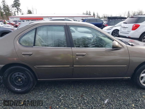 1999 Nissan Altima XE with VIN 1N4DL01D1XC210017, listed as a IAAI auction lot 41199544 with 297,917 mi miles. Bid and sale history available at carsss.com. Image 13.