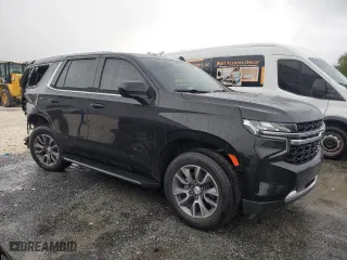 2021 Chevrolet Tahoe LS with VIN 1GNSCMKD4MR335973, listed as a Copart auction lot 69972594 with 42,129 mi miles and Salvage Title. Bid and sale history available at carsss.com. Image 4.