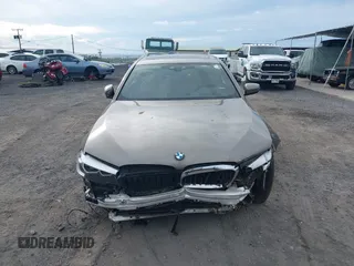 2019 BMW 5 Series 540i with VIN WBAJE5C52KWA98653, listed as a IAAI auction lot 41398589 with Not provided miles and . Bid and sale history available at DreamBid. Image 12.