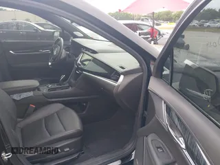 2023 Cadillac XT6 FWD Premium Luxury with VIN 1GYKPCRS6PZ106284, listed as a IAAI auction lot 41595617 with 32,795 mi miles and . Bid and sale history available at DreamBid. Image 5.
