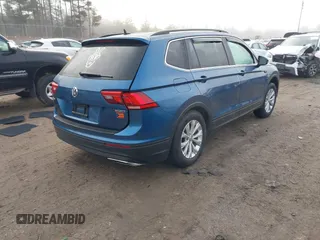 2019 Volkswagen Tiguan SE with VIN 3VV2B7AX4KM017280, listed as a IAAI auction lot 41786487 with 119,949 mi miles and . Bid and sale history available at DreamBid. Image 4.