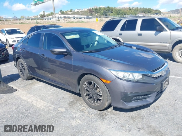 2016 Honda Civic Sedan LX with VIN 19XFC2F51GE034644, listed as a IAAI auction lot 41939884 with 59,433 mi miles. Bid and sale history available at carsss.com. Image 1.