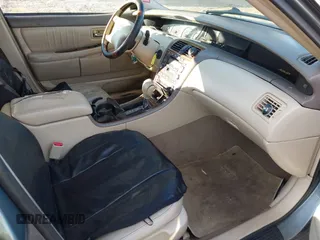 2004 Toyota Avalon XL with VIN 4T1BF28B44U375103, listed as a IAAI auction lot 41903924 with 329,027 mi miles and . Bid and sale history available at carsss.com. Image 5.