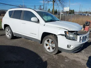 2014 Jeep Compass Latitude with VIN 1C4NJCEB0ED660019, listed as a IAAI auction lot 41200065 with 185,174 mi miles. Bid and sale history available at carsss.com. Image 1.