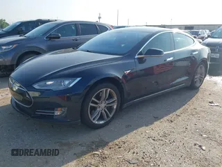 2014 Tesla Model S 60 with VIN 5YJSA1H12EFP39873, listed as a IAAI auction lot 42443414 with 132,773 mi miles and . Bid and sale history available at DreamBid. Image 2.
