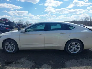 2014 Chevrolet Impala LT with VIN 1G1125S33EU101464, listed as a IAAI auction lot 41863521 with 215,270 mi miles and . Bid and sale history available at DreamBid. Image 15.