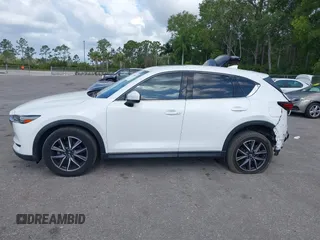 2018 Mazda CX-5 Grand Touring with VIN JM3KFBDM6J0451605, listed as a IAAI auction lot 42099182 with 81,703 mi miles and . Bid and sale history available at DreamBid. Image 14.
