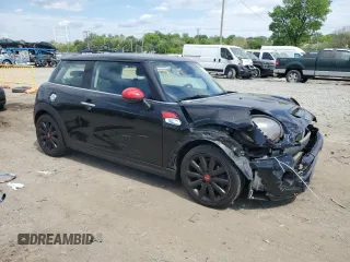 2015 MINI Hardtop S z VIN WMWXP7C50F2A36388, wystawiony jako Copart lot #54910345 z przebiegiem 69 956 mil mil oraz Szkoda całkowita • Salvage title. Historia ofert i sprzedaży dostępna na DreamBid. Obrazek 4.