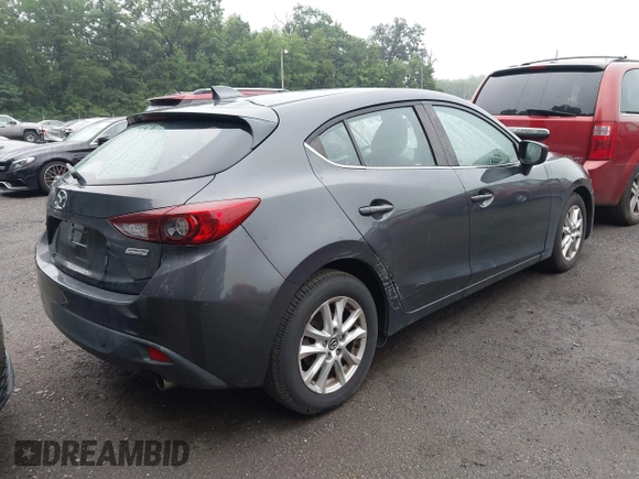 2015 Mazda 3 i Grand Touring with VIN 3MZBM1M72FM228899, listed as a IAAI auction lot 42612074 with 149,226 mi miles and . Bid and sale history available at DreamBid. Image 4.