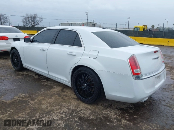 2014 Chrysler 300 with VIN 2C3CCAAG2EH235495, listed as a IAAI auction lot 41787801 with 142,354 mi miles and . Bid and sale history available at DreamBid. Image 3.