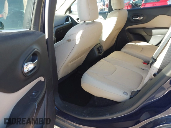 2015 Jeep Cherokee Latitude with VIN 1C4PJMCS0FW583658, listed as a IAAI auction lot 41106819 with 101,849 mi miles. Bid and sale history available at carsss.com. Image 8.