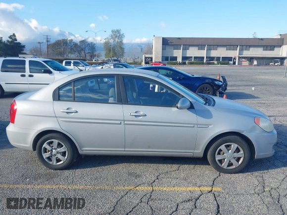 2006 Hyundai Accent GLS with VIN KMHCN46C86U007833, listed as a IAAI auction lot 41760603 with 60,030 mi miles. Bid and sale history available at carsss.com. Image 13.
