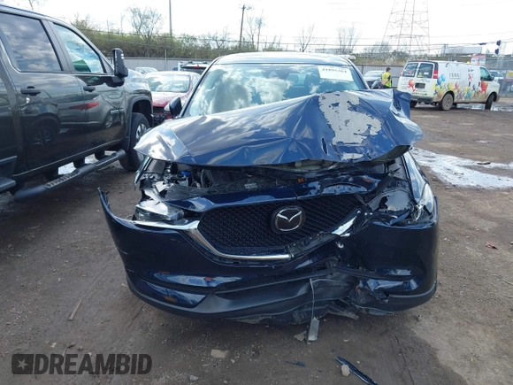 2018 Mazda CX-5 Touring with VIN JM3KFBCM5J0369799, listed as a IAAI auction lot 41895364 with 76,801 mi miles and . Bid and sale history available at carsss.com. Image 12.