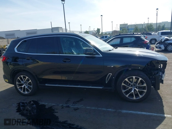 2022 BMW X5 xDrive45e with VIN 5UXTA6C08N9K85766, listed as a IAAI auction lot 41461039 with 95,003 mi miles. Bid and sale history available at carsss.com. Image 14.