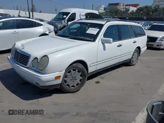 1999 Mercedes-Benz E-Class with VIN WDBJH65F7XA787254, listed as a IAAI auction lot 41884002 with 1 mi miles. Bid and sale history available at carsss.com. Image 2.