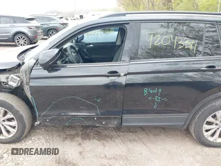 2018 Volkswagen Tiguan S with VIN 3VV1B7AX1JM076071, listed as a IAAI auction lot 42043311 with 107,883 mi miles and . Bid and sale history available at DreamBid. Image 14.