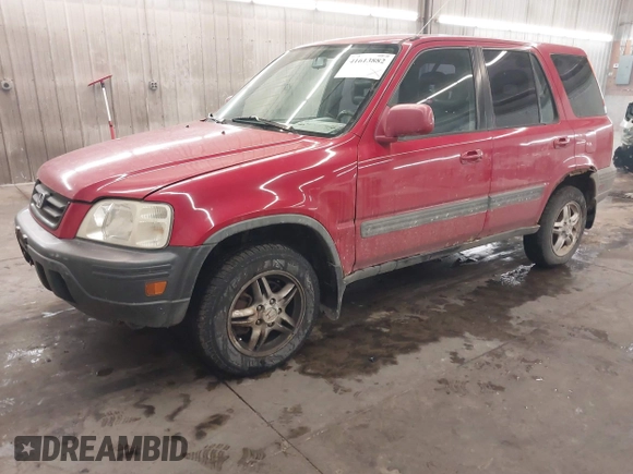 2000 Honda CR-V EX with VIN JHLRD1861YC009880, listed as a IAAI auction lot 41613882 with 238,499 mi miles. Bid and sale history available at carsss.com. Image 2.