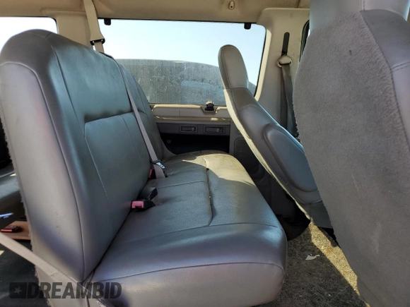 2009 Ford Econoline Passenger XL z VIN 1FMNE11W19DA56899, wystawiony jako Copart lot #76610224 z przebiegiem 144 111 mil mil oraz Szkoda całkowita • Salvage title. Historia ofert i sprzedaży dostępna na DreamBid. Obrazek 11.