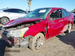 2009 Ford Focus SEL with VIN 1FAHP37N49W106730, listed as a IAAI auction lot 41838457 with 103,718 mi miles. Bid and sale history available at carsss.com. Image 2.