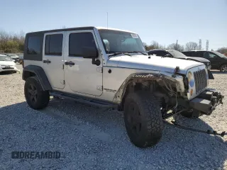 2010 Jeep Wrangler Unlimited Rubicon with VIN 1J4BA6H12AL107485, listed as a Copart auction lot 48802825 with 123,299 mi miles and Salvage title. Bid and sale history available at DreamBid. Image 4.