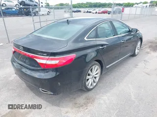 2014 Hyundai Azera Limited z VIN KMHFH4JG5EA353031, wystawiony jako IAAI lot #42481763 z przebiegiem 90 244 mil mil oraz . Historia ofert i sprzedaży dostępna na DreamBid. Obrazek 4.