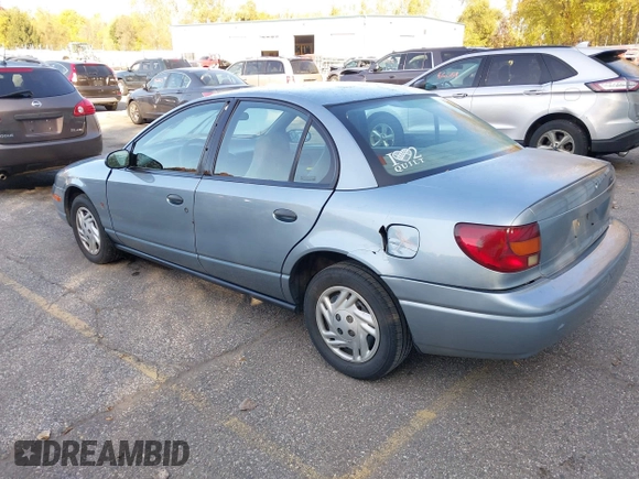 2002 Saturn SL z VIN 1G8ZS528327278417, wystawiony jako IAAI lot #40611406 z przebiegiem 227 283 mil mil oraz . Historia ofert i sprzedaży dostępna na DreamBid. Obrazek 3.