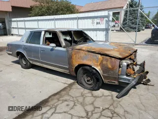 1986 Pontiac Bonneville Brougham z VIN 2G2GR69H9G2241181, wystawiony jako Copart lot #68122684 z przebiegiem Nie podano mil oraz Nie do naprawy • Non repairable. Historia ofert i sprzedaży dostępna na DreamBid. Obrazek 4.