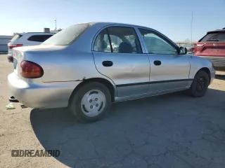1996 Hyundai Accent z VIN KMHVF14N4TU316378, wystawiony jako Copart lot #88981945 z przebiegiem 128 650 mil mil oraz Tytuł czysty. Historia ofert i sprzedaży dostępna na DreamBid. Obrazek 3.