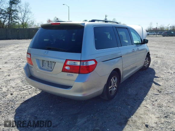 2007 Honda Odyssey EX-L with VIN 5FNRL387X7B080906, listed as a IAAI auction lot 41910061 with 229,717 mi miles and . Bid and sale history available at DreamBid. Image 4.