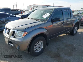 2021 Nissan Frontier SV with VIN 1N6ED0EB2MN702654, listed as a IAAI auction lot 42227414 with 142,309 mi miles and . Bid and sale history available at DreamBid. Image 2.