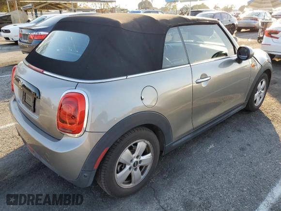 2019 MINI Convertible Cooper с VIN WMWWG5C5XK3F79624, выставлен на аукционе Copart как лот 42047405 с пробегом 52 977 миль миль и Списание • Salvage title. История ставок и продаж доступна на DreamBid. Изображение 3.