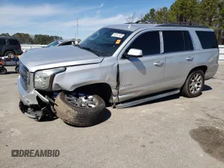 2015 GMC Yukon SLE with VIN 1GKS2AKC8FR666158, listed as a Copart auction lot 45747105 with 189,596 mi miles and Salvage Title. Bid and sale history available at carsss.com. Image 1.